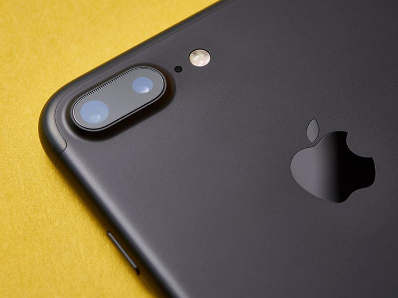 Smartphone on a yellow desk, where most ad clicks happen